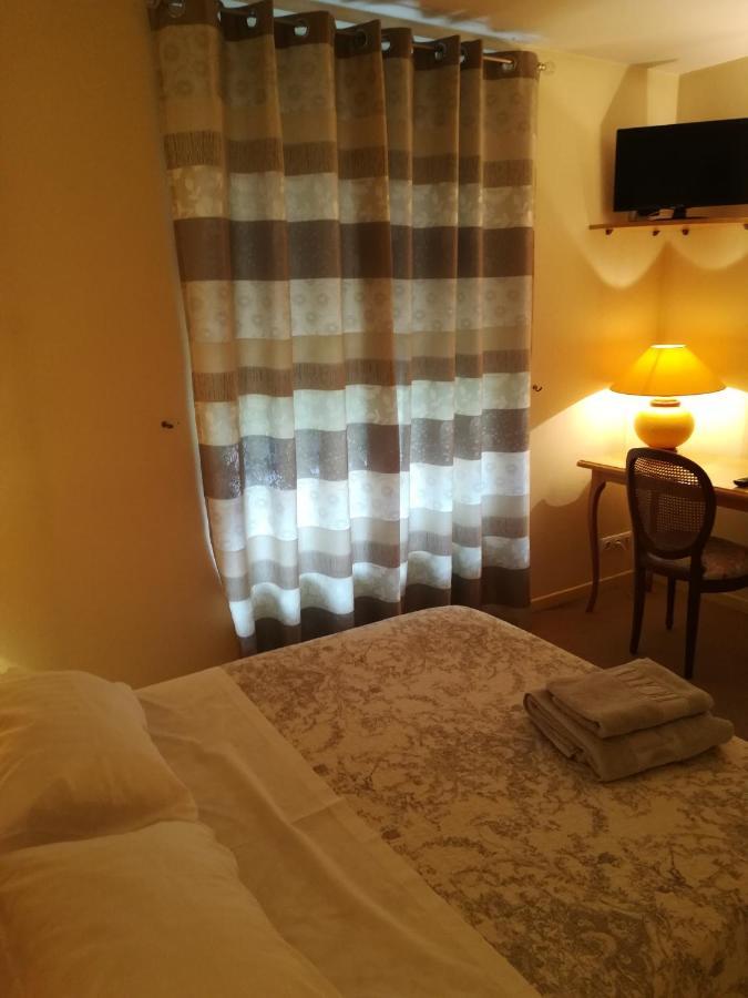 Hotel De La Place Liffol-le-Grand ภายนอก รูปภาพ